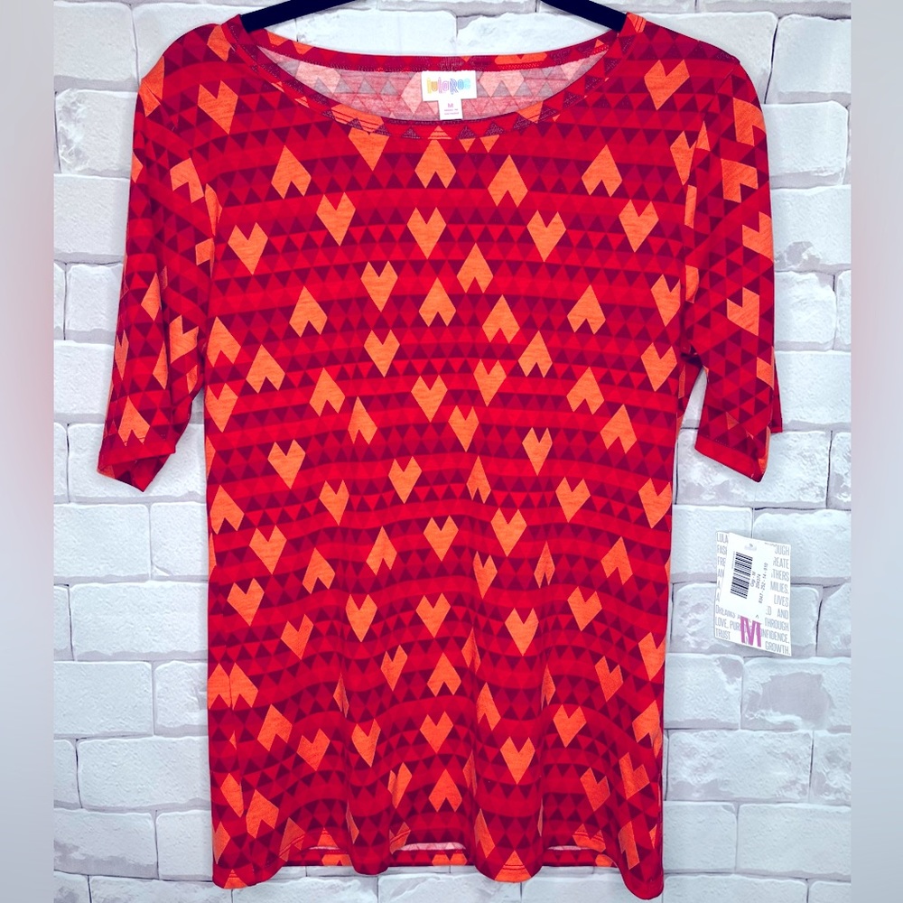 NWT LuLaRoe Gigi fitted top. Size Medium. Super cute red heart pattern.